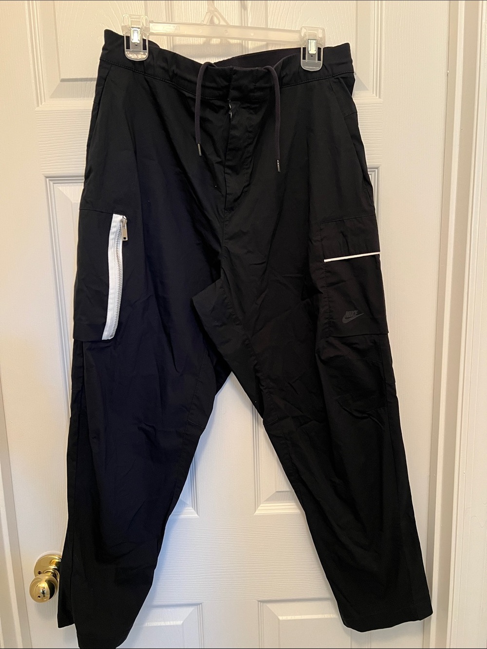 Nike Men’s Black Cargo Pants with White Zip Accents